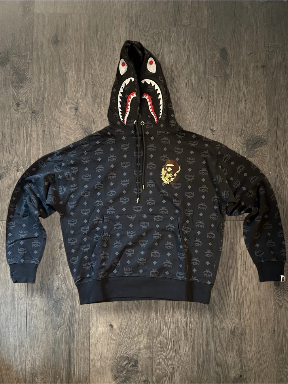 A Bathing Ape × MCM Men's Shark Graphic Hoodie Black Knit Cotton
Size Medium